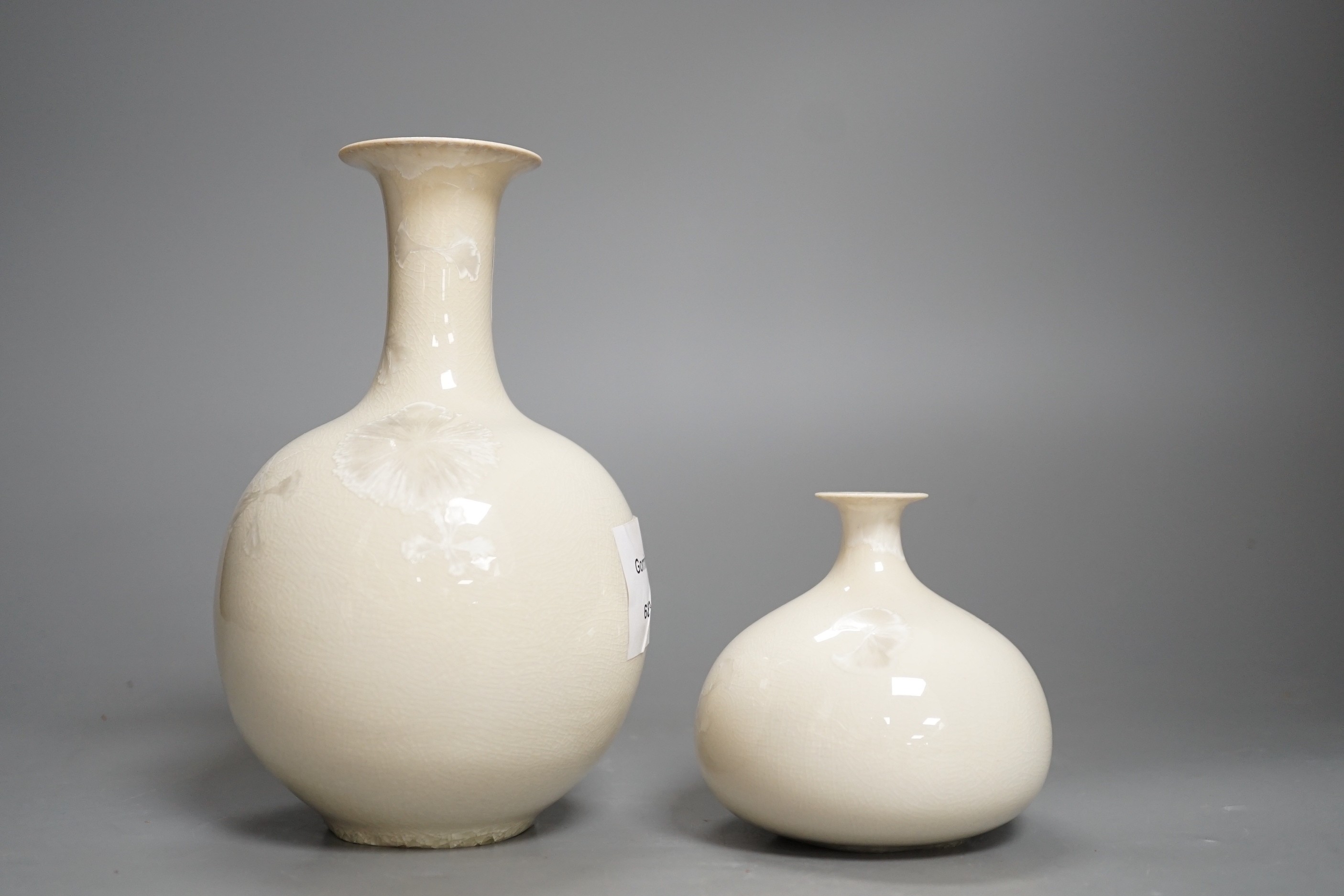 Two studio pottery white glazed bottle shaped vases, incised makers marks Ulich ? Tallest 17cm